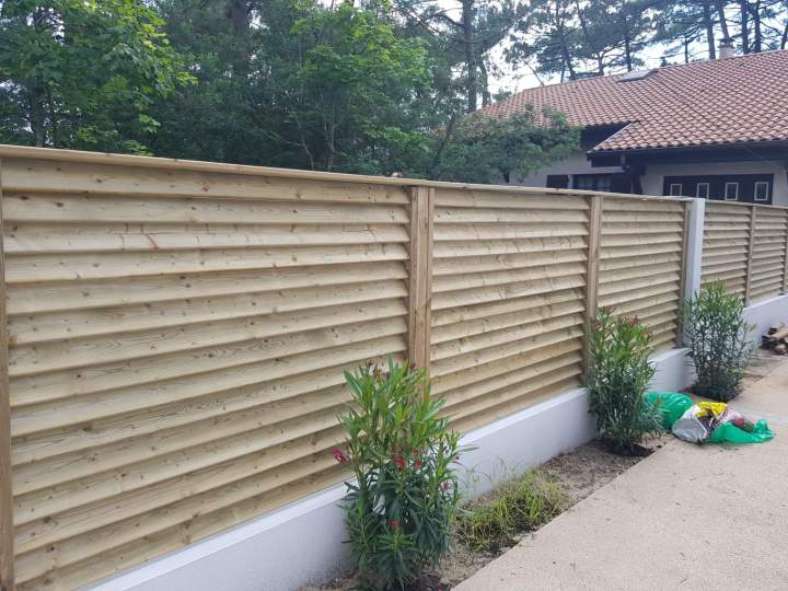 Expert en conception de clôture bois